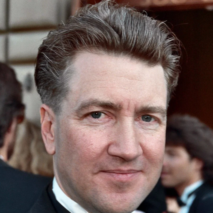 David Lynch in a tuxedo and bow tie, close-up of his face